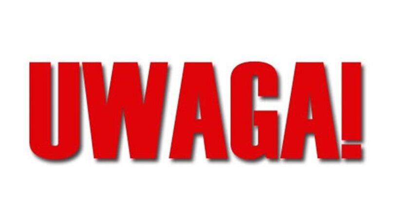 Czerwony napis "UWAGA" na białym tle.
