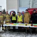 Na zdjęciu znajdują się policjant z Komendy Powiatowej Policji w Wolsztynie, pracownicy Powiatowej Stacji Sanitarno-Epidemiologicznej w Wolsztynie oraz strażacy z Komendy Powiatowej Państwowej Straży Pożarnej.